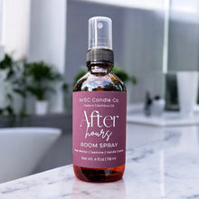Load image into Gallery viewer, WSC Candle Co. After Hours Room Spray bottle on a marble surface with a blurred bathroom background