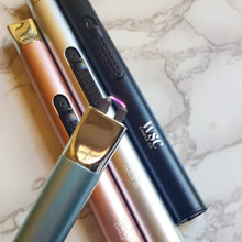 Load image into Gallery viewer, four lighters in different colors, showing the electric arc