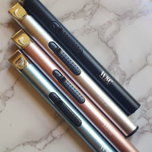 Load image into Gallery viewer, Four lighters laying on a marble background
